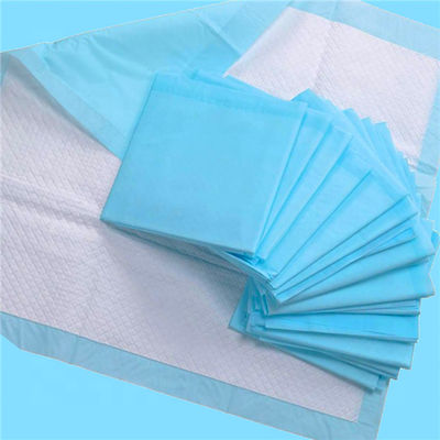 Geborduurd ziekenhuisbed met eenmalig gebruik met fluffpulp SAP-type absorberend middel onder het pad