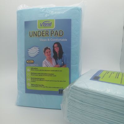 Geborduurd ziekenhuisbed met eenmalig gebruik met fluffpulp SAP-type absorberend middel onder het pad